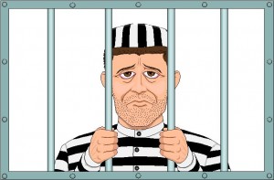 man-in-prison-behind-bars-jail